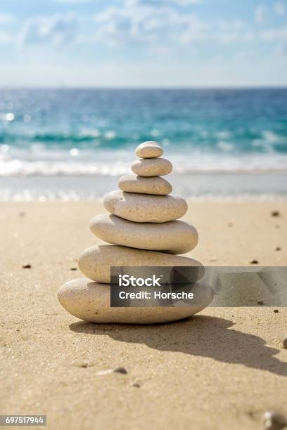 Stacked Tower Of Balancing Smooth Pebbles Stock Photo - Download Image Now - Art Product, Balance, Balanced Rock