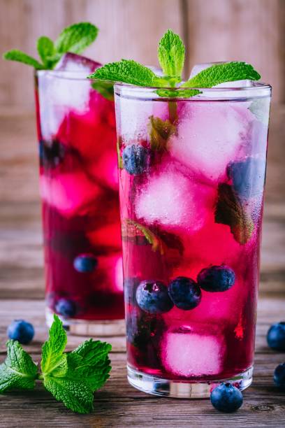 istock Blueberry ice lemonade with mint in glasses 697524088