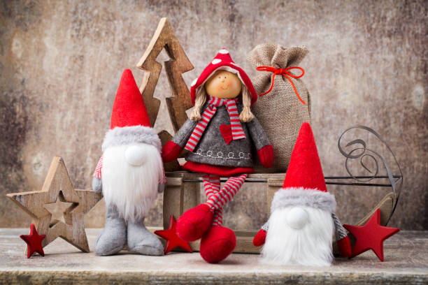 istock Christmas greeting card. Noel gnome background. Christmas symbol. 697545734