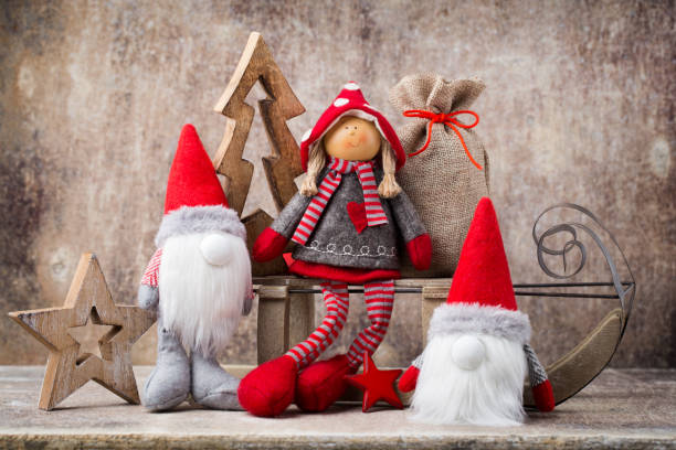 istock Christmas greeting card. Noel gnome background. Christmas symbol. 697547896