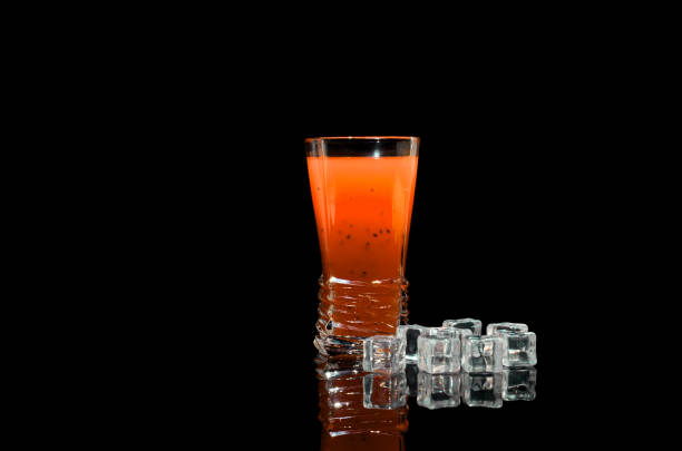 istock Orange juice with basil seeds drink 697548942