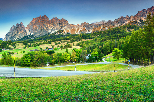 Famous alpine touristic resort with high mountains and green fields, Dolomites, Cortina D Ampezzo, Italy, Europe