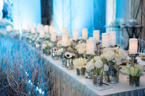 istock Wedding decor. Candles in candelabrum and roses 697558346