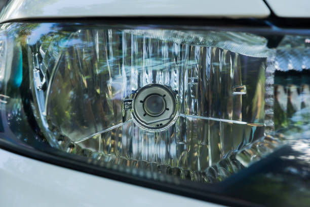 istock Close Up of Car headlights 697561880