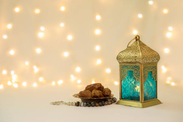 istock Lantern and Dates fruits in front of bokeh Background 697569186