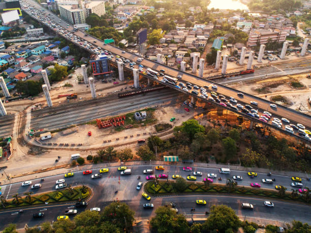 istock Traffic jam in rush hour,expressway. Freight and passenger train waiting at the train station parking lot.Cargo transit.import export and business logistic.Aerial view.Top view. Railway construction 697573284