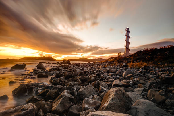 Sunset shot at seashore of Sisiman bay with lighthouse, Mariveles - Philippines