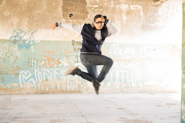 istock Hip hop dancer in the air 697580806