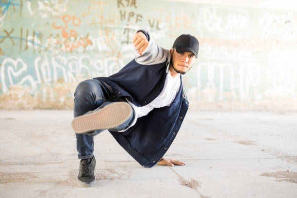 istock Hip hop dancer in an urban setting 697583624