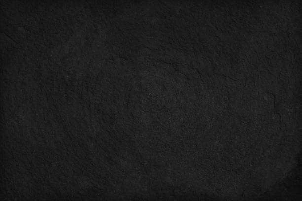 istock Black Stone background. Dark gray texture close up high quality May be used blank for design. Copy space 697583866