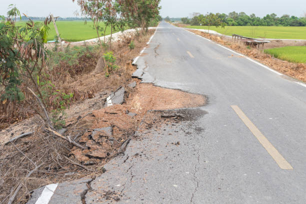 istock Asphalt surface on the street was demolished due to poor construction. 697583880