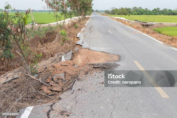 Asphalt Surface On The Street Was Demolished Due To Poor Construction Stock Photo - Download Image Now