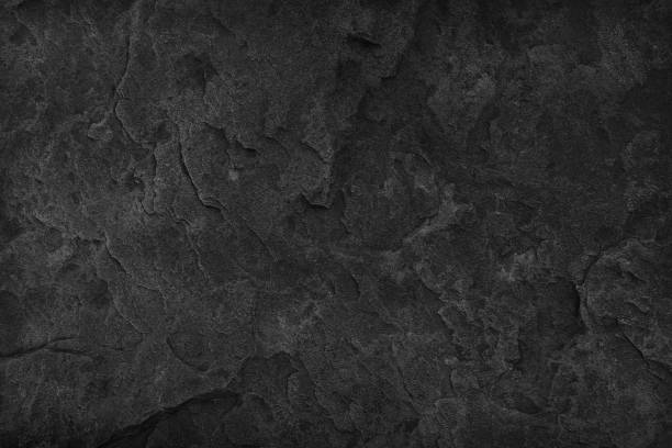 sfondo pietra nera. la texture grigio scuro da vicino di alta qualità può essere utilizzata vuota per il design. spazio di copia - lavagnetta di ardesia foto e immagini stock