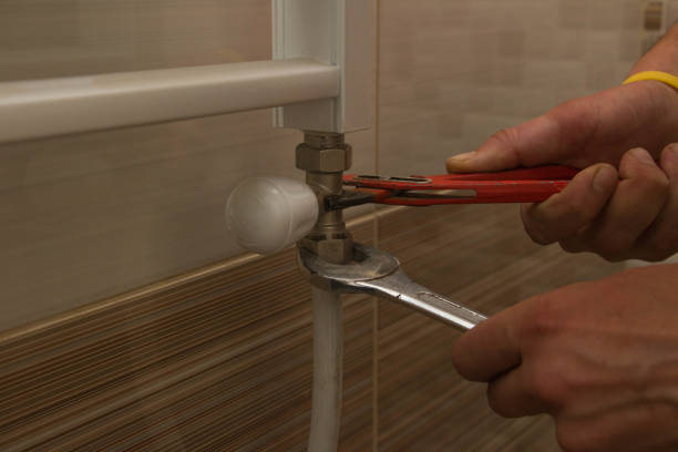 istock Installation of a bathroom radiator 697587918