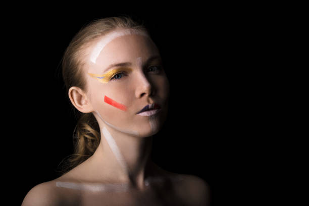 istock Girl with colorful make-up. 697588300