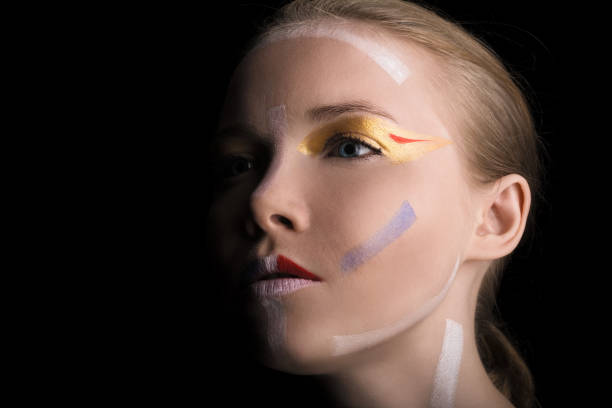 istock Girl with colorful make-up. 697589704