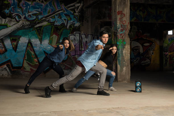 istock Urban dancers showing some moves 697590466