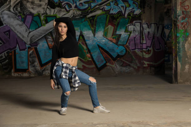 istock Female urban dancer trying out some moves 697593918