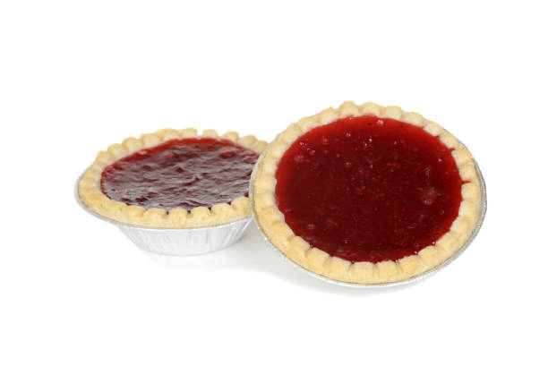 istock two strawberry tarts in foil cups 697594612