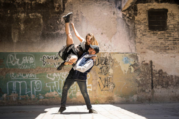 istock Couple of dancers performing together 697597968