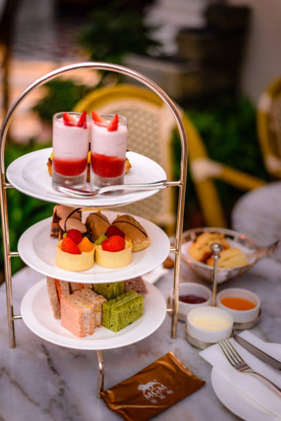 istock three tier afternoon tea set and pastries 697600762