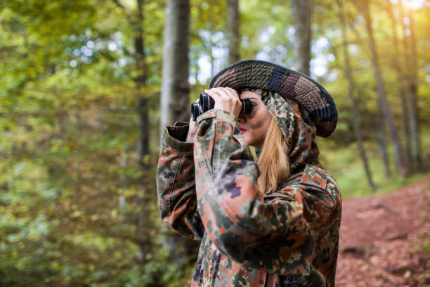 istock Woman patrol with binocular 697604530