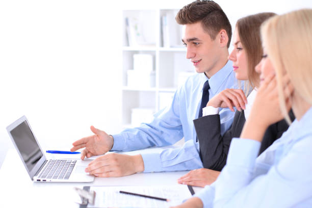 istock Business people at meeting 697610728