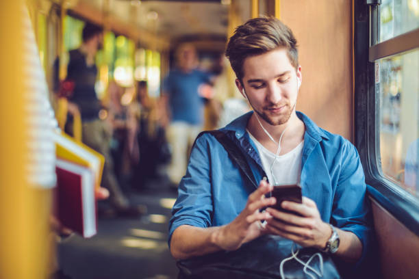 checking messages - transportation bus mode of transport public transportation imagens e fotografias de stock