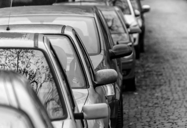 istock Cars Parked On Street 697615277