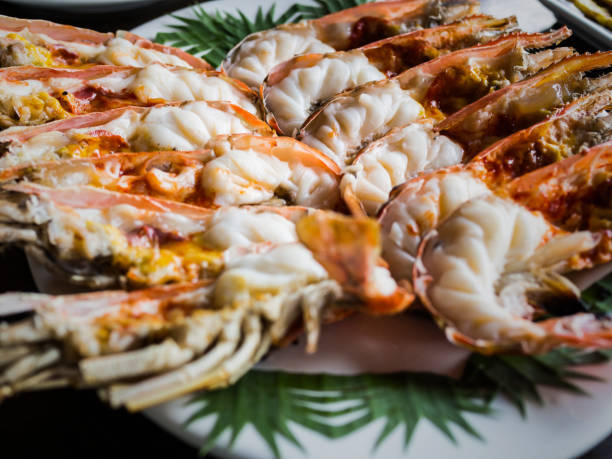 istock grilled shrimps, river prawns, Thai food 697618420