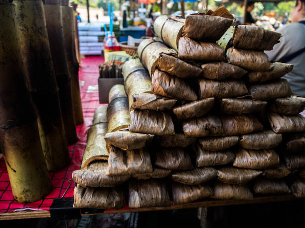 istock Glutinous rice baked in a bamboo cylinder 697618914