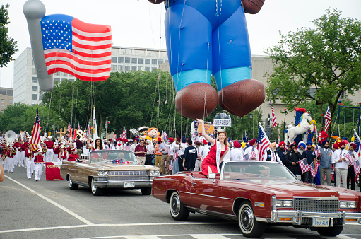Beauty queens and vintage convertibles at the Fourth of July parade, Washington, DC, 2015.