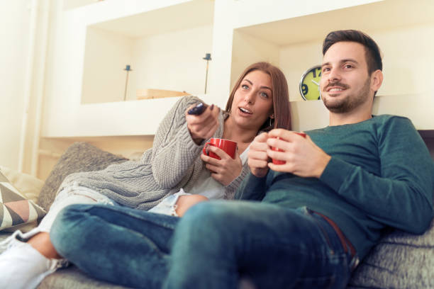 istock Young couple at home 697622220