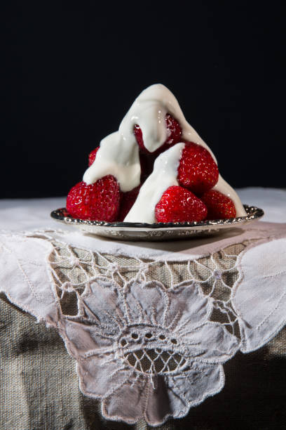 istock Fresh strawberries on a silver saucer 697625880