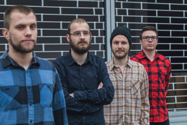istock All dressed in plaid shirts 697626808