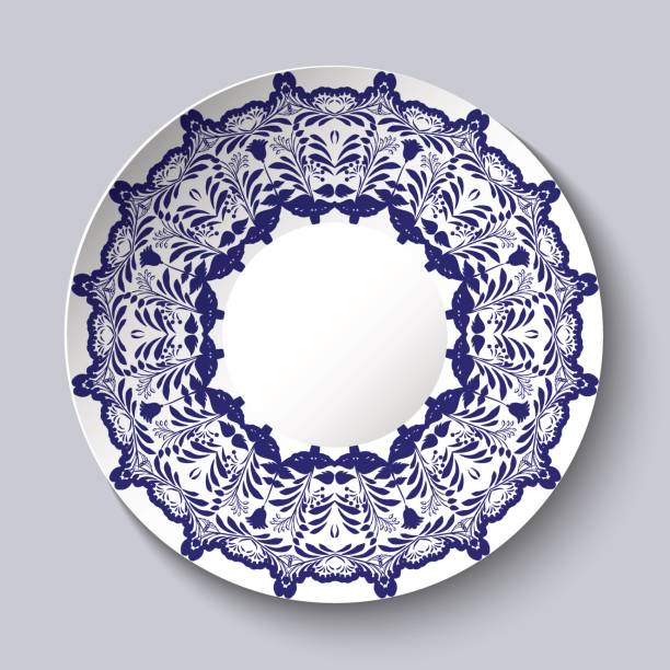 illustrazioni stock, clip art, cartoni animati e icone di tendenza di piatto decorativo in ceramica con motivo floreale blu. - plate blue dishware white