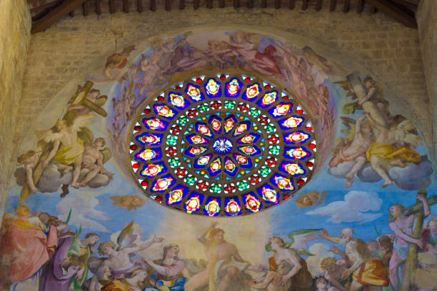 istock Todi, Umbria, Italy: Rose Window, Frescoes in Gothic Cathedral 697633740