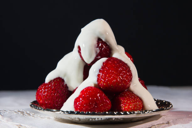 istock Fresh strawberries on a silver saucer 697634028
