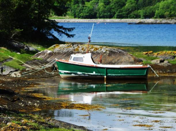 istock Fishing Boat moored on Loch Linnhe, Scotland, UK 697640106
