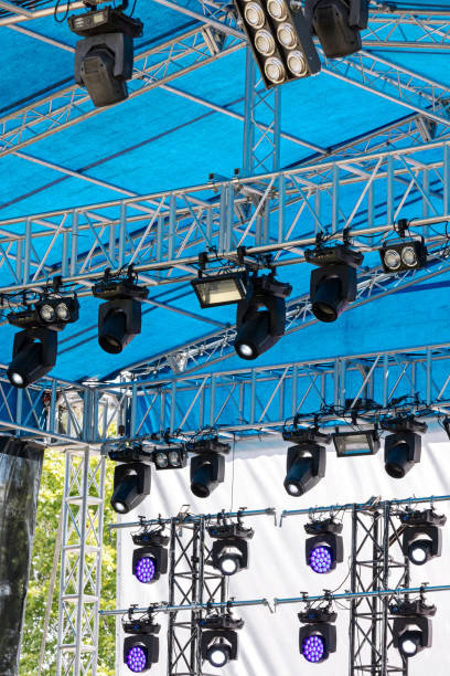 istock professional spotlight system of outdoor stage under blue roof 697648212