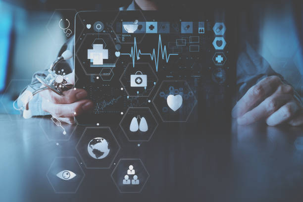istock medical techonlogy concept,smart doctor hand working with modern laptop computer in modern office with virtual icon diagram 697650888