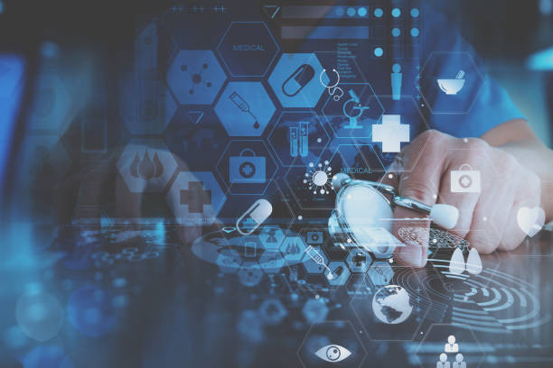 istock smart doctor hand working with modern laptop computer in modern office with virtual icon diagram 697650908