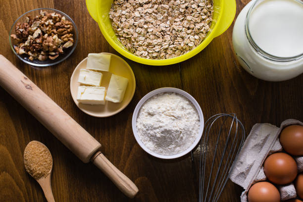 istock Ingredients for baking on wooden table 697651392
