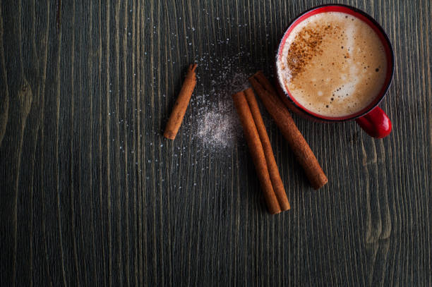 istock Ceramics red cup of coffee with cinnamon 697661062