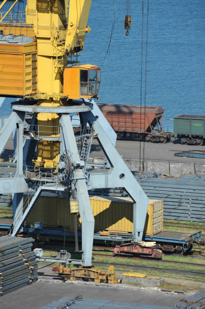 istock Port cargo crane, train and metal 697661386