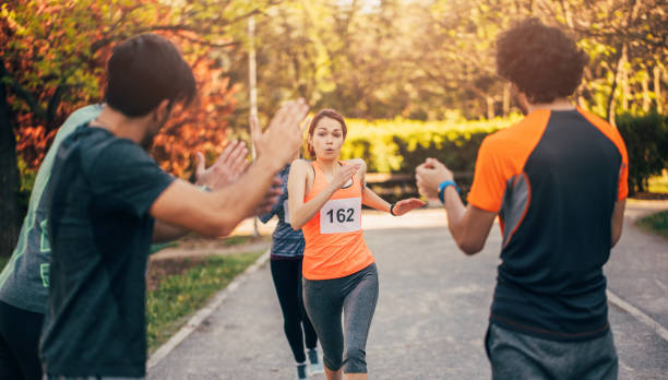 istock Woman winning a running race 697661472