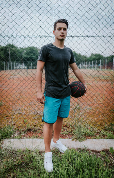 istock Man with basketball in hands 697663832