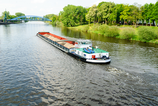 Cargo ship on the river Weser near Nienburg