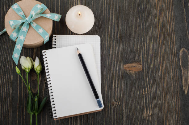 istock Blank notebooks, gift with green ribbon 697663976