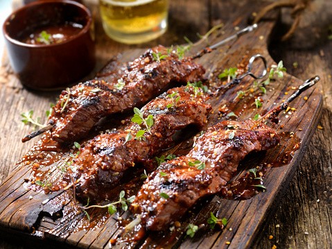 Seasoned BBQ Steak Skewers with Fresh Herbs and a couple of Beers